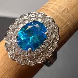 Blue and white CZ halo sterling silver ring size 8